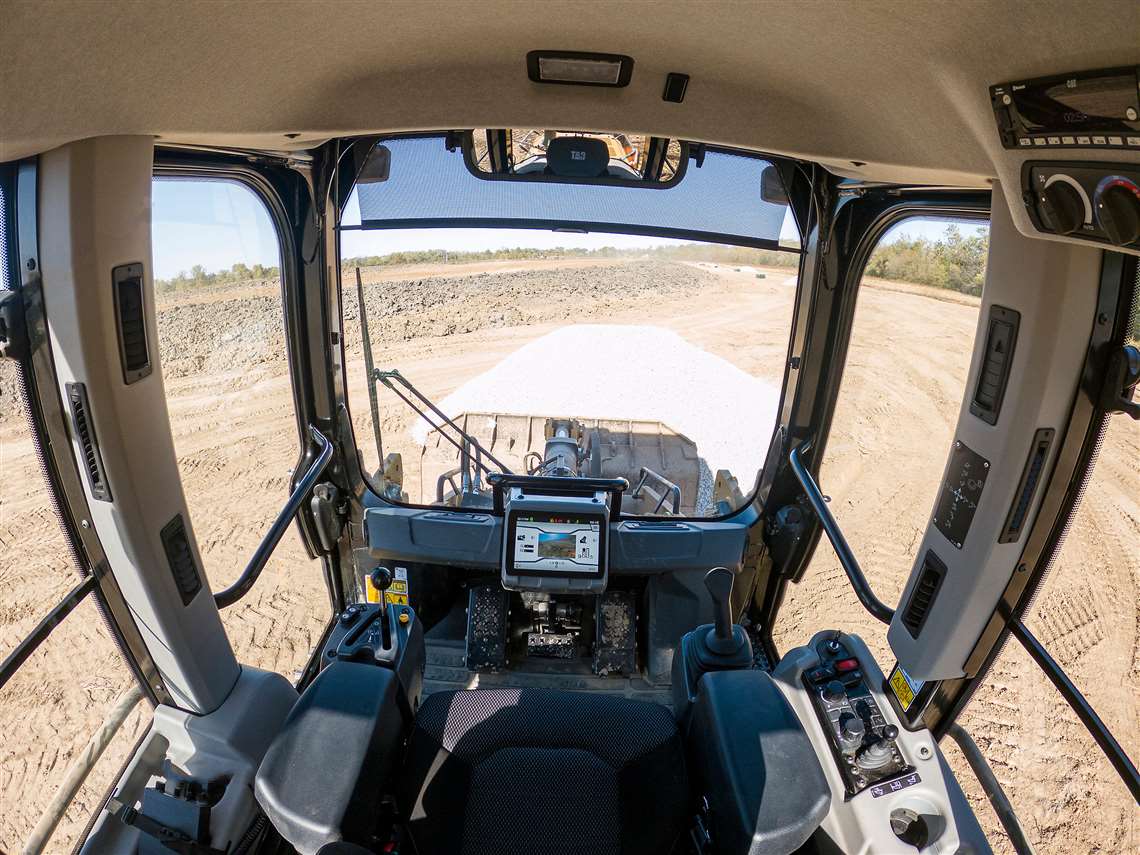 Inside the cab of the Cat 953 tracked loader