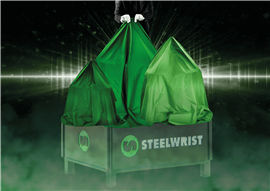 A podium with a green shroud covering new products about to be revealed