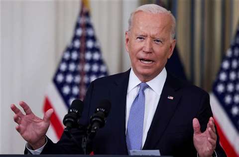 U.S. President Joe Biden responds to a question from a reporter after speaking about Covid-19 vaccines and booster shots in the State Dining Room at the White House, September 24, 2021. REUTERS/Evelyn Hockstein/File Photo