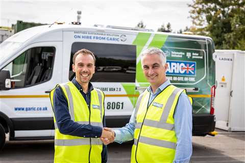 Gene Lewis (LiNa CEO) and Mark Albiston (Garic CEO) shake hands in front of Hybrid Welfare Van