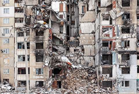 A destroyed apartment building in Kharkhiv, Ukraine