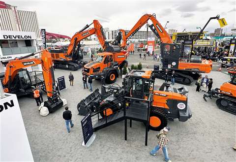 Orange Develon construction machines at ConExpo 2023