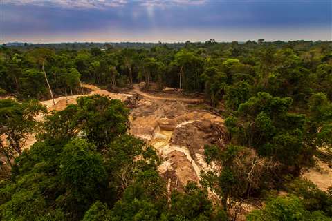 Illegal mining causes deforestation and river pollution in the Amazon rainforest near Menkragnoti Indigenous Land. - Pará, Brazil 